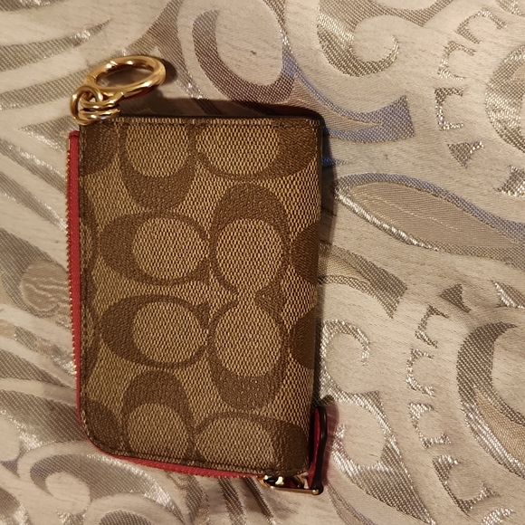 Like new pink coach backpack along with wristlet and small wallet - Picture 8 of 12